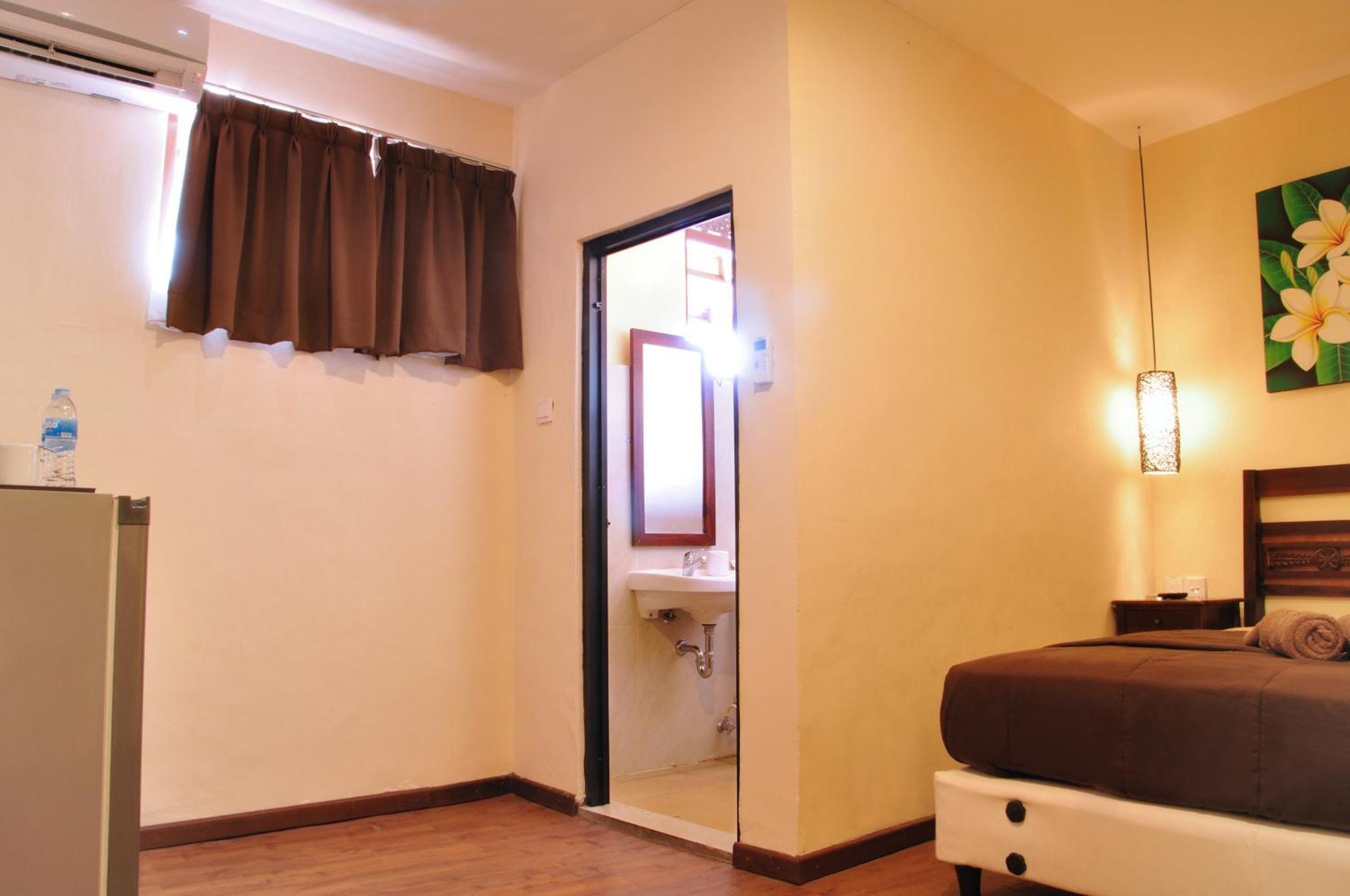 Bemo Corner Guest House Kuta Lombok Habitación foto